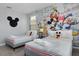 Mickey Mouse themed bedroom with twin beds at 771 Drop Shot Dr, Davenport, FL 33896