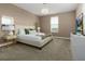 Large bedroom with king-size bed, TV, and ample closet space at 771 Drop Shot Dr, Davenport, FL 33896