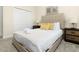 Comfortable bedroom with a queen bed and double door closet at 771 Drop Shot Dr, Davenport, FL 33896