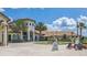 Oasis Clubhouse at ChampionsGate, featuring a fountain and lounge areas at 771 Drop Shot Dr, Davenport, FL 33896