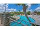 Resort-style pool with a lazy river, water slide, and plenty of lounge chairs at 771 Drop Shot Dr, Davenport, FL 33896