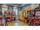 Game room featuring various arcade games and pinball at 771 Drop Shot Dr, Davenport, FL 33896