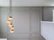 Modern light fixture with sleek design and warm lighting at 771 Drop Shot Dr, Davenport, FL 33896