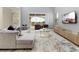 Spacious living room with comfortable seating and large windows at 771 Drop Shot Dr, Davenport, FL 33896
