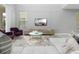Living room with comfortable seating and a modern coffee table at 771 Drop Shot Dr, Davenport, FL 33896