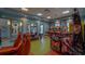Fun game room with arcade games and air hockey at 771 Drop Shot Dr, Davenport, FL 33896