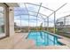 Enclosed pool and spa area with a view at 771 Drop Shot Dr, Davenport, FL 33896