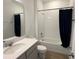 Clean bathroom with bathtub and shower at 835 Griffon Ave, Lake Alfred, FL 33850