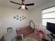 bedroom with a twin bed and playful decor at 835 Griffon Ave, Lake Alfred, FL 33850