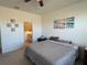 Spacious bedroom with large bed and ensuite bathroom access at 835 Griffon Ave, Lake Alfred, FL 33850