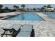 Large community pool with plenty of lounge chairs at 835 Griffon Ave, Lake Alfred, FL 33850