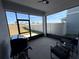 Spacious screened patio overlooking the backyard at 835 Griffon Ave, Lake Alfred, FL 33850