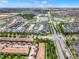 Aerial view of neighborhood showcasing homes and streets at 8886 Geneve Ct, Kissimmee, FL 34747