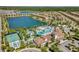 Community pool and surrounding homes at 8886 Geneve Ct, Kissimmee, FL 34747