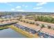 Aerial view of community, showcasing lakefront location at 8886 Geneve Ct, Kissimmee, FL 34747