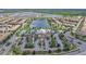 Aerial view of community with pool and residential homes at 8886 Geneve Ct, Kissimmee, FL 34747