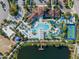 Aerial view of community amenities including pool and clubhouse at 8886 Geneve Ct, Kissimmee, FL 34747