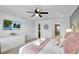 Main bedroom with king size bed and en-suite bathroom at 8886 Geneve Ct, Kissimmee, FL 34747