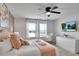 Main bedroom with king size bed and TV at 8886 Geneve Ct, Kissimmee, FL 34747