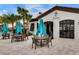 Outdoor seating area at Tu Casa Bar & Lounge, a community amenity at 8886 Geneve Ct, Kissimmee, FL 34747