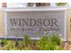 Community entrance sign with landscaping and the name Windsor at Westside at 8886 Geneve Ct, Kissimmee, FL 34747