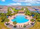 Resort-style pool with surrounding lounge chairs and a shaded pavilion at 8886 Geneve Ct, Kissimmee, FL 34747