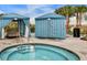 Private cabanas surround a refreshing hot tub at 8886 Geneve Ct, Kissimmee, FL 34747