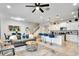Open concept living area with kitchen and stairs at 8886 Geneve Ct, Kissimmee, FL 34747