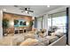 Living room with wood accent wall and access to patio at 8886 Geneve Ct, Kissimmee, FL 34747