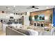 Open concept living room and kitchen with modern decor at 8886 Geneve Ct, Kissimmee, FL 34747