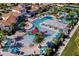 Resort-style pool area with water features and lounge chairs at 8886 Geneve Ct, Kissimmee, FL 34747