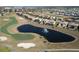 Luxury homes surrounding a golf course and lake at 9234 Sommerset Hills Dr, Davenport, FL 33896