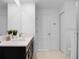 Double vanity bathroom with dark cabinets at 9234 Sommerset Hills Dr, Davenport, FL 33896