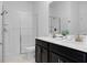 Double vanity bathroom with a large shower at 9234 Sommerset Hills Dr, Davenport, FL 33896