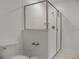 Bright bathroom with a large shower and toilet at 9234 Sommerset Hills Dr, Davenport, FL 33896