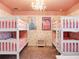 Pink bedroom with bunk beds and princess theme at 9234 Sommerset Hills Dr, Davenport, FL 33896