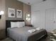 Modern bedroom with stylish decor and large windows at 9234 Sommerset Hills Dr, Davenport, FL 33896