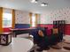 Mickey Mouse themed game room, pool table, and plenty of space at 9234 Sommerset Hills Dr, Davenport, FL 33896