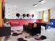 Mickey Mouse themed game room with pool table and comfortable seating at 9234 Sommerset Hills Dr, Davenport, FL 33896