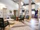 Spacious community clubhouse lobby with seating at 9234 Sommerset Hills Dr, Davenport, FL 33896