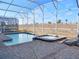 Relaxing pool and spa with screened enclosure at 9234 Sommerset Hills Dr, Davenport, FL 33896