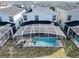 Screened-in pool and spa with a covered patio area at 9234 Sommerset Hills Dr, Davenport, FL 33896