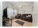 Living room with brown leather couches and a large TV at 2507 Talega Dr, St Cloud, FL 34772