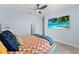 Bedroom with large TV and comfy bed at 12209 Wild Iris Way # 110, Orlando, FL 32837