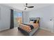 Bedroom with a ceiling fan and access to a balcony at 12209 Wild Iris Way # 110, Orlando, FL 32837
