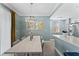 Elegant dining room with chandelier and gold accents at 12209 Wild Iris Way # 110, Orlando, FL 32837
