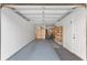 Attached garage with shelving for storage at 12209 Wild Iris Way # 110, Orlando, FL 32837