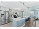 Modern kitchen with stainless steel appliances and white quartz countertops at 12209 Wild Iris Way # 110, Orlando, FL 32837