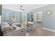 Spacious living room with light walls and stylish furniture at 12209 Wild Iris Way # 110, Orlando, FL 32837