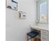 Small vanity area with a stool and artwork at 12209 Wild Iris Way # 110, Orlando, FL 32837
